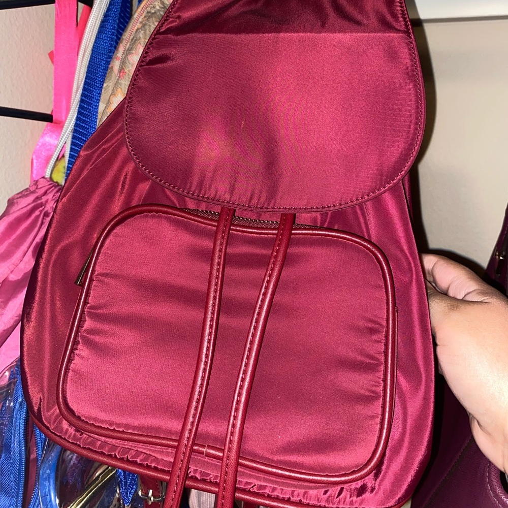 Forever21 mini maroon backpack.
